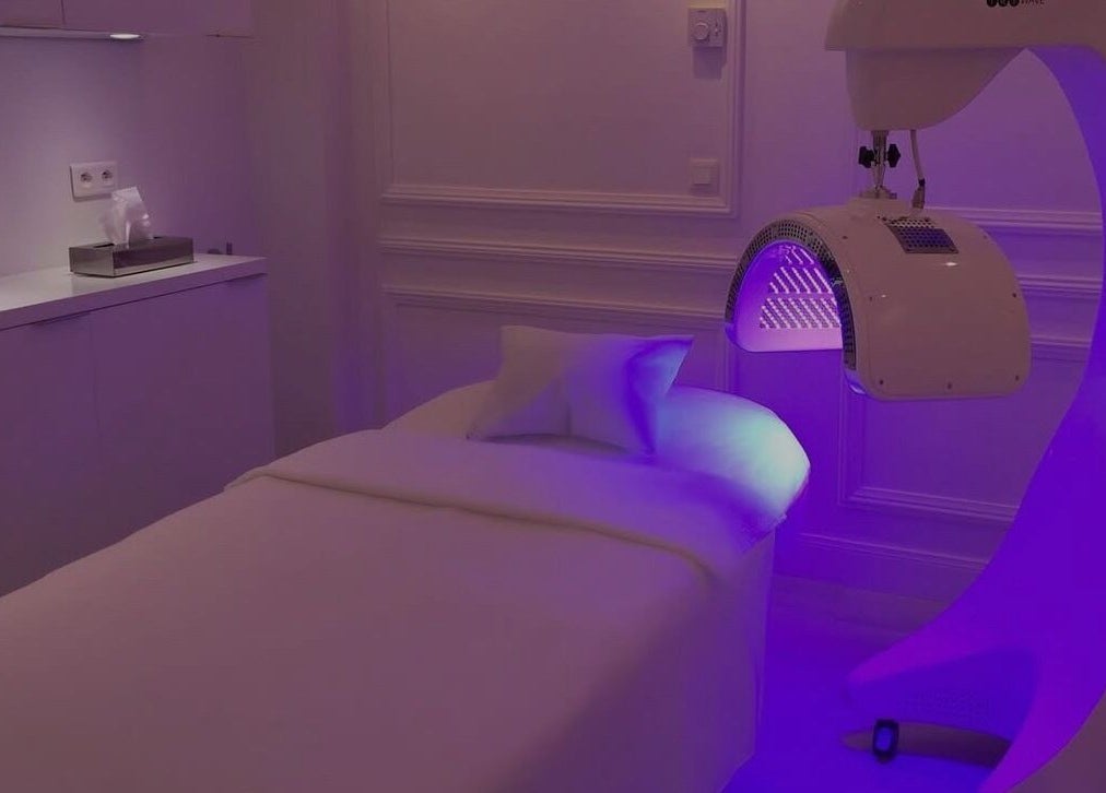 Treatment room at Elle Esthetics: Ashbourne Skin & Laser Clinic in Ashbourne, County Meath, IE with ambient lighting.