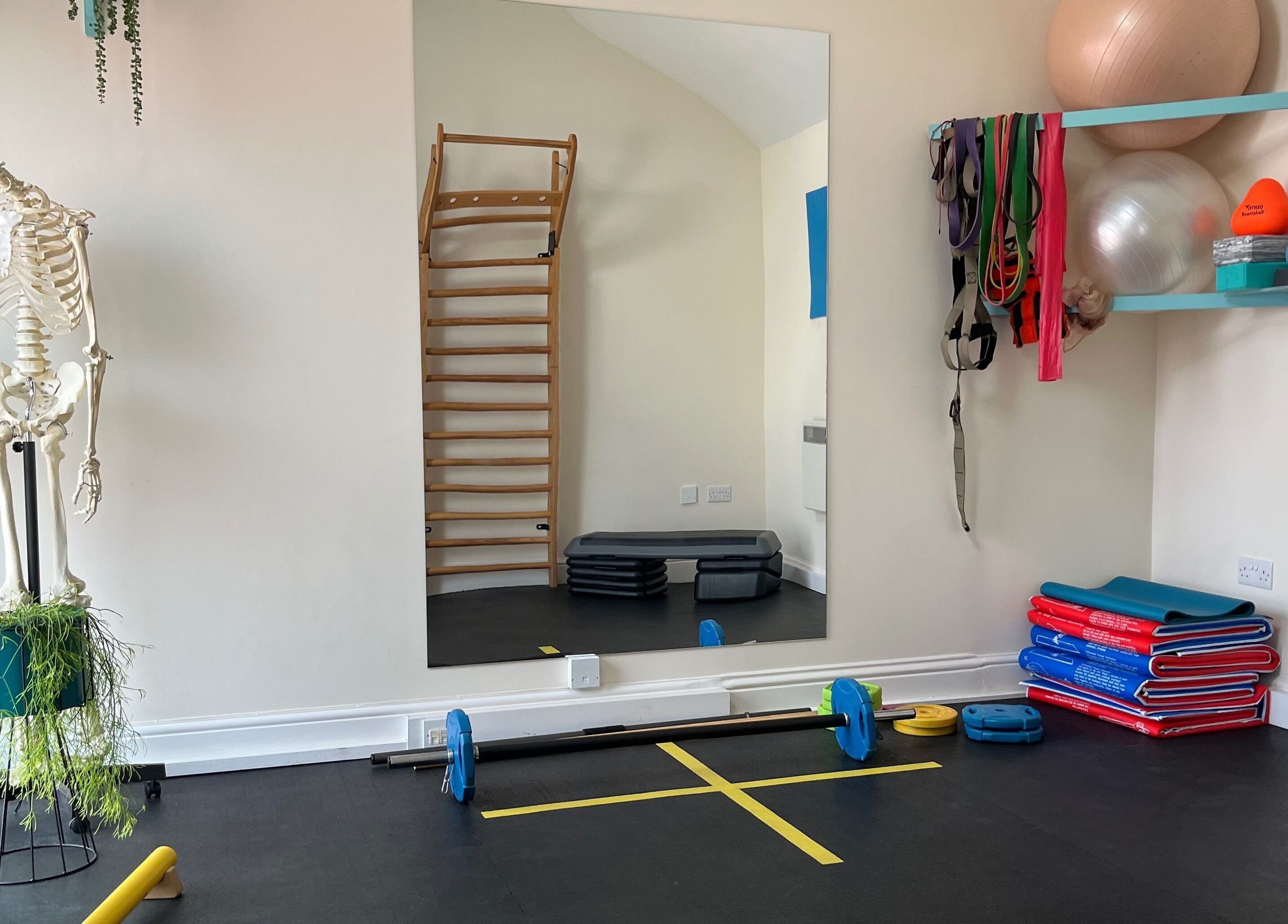 Fitness room at Fern Bodyworks, Hextable, England, GB with exercise equipment and decor.