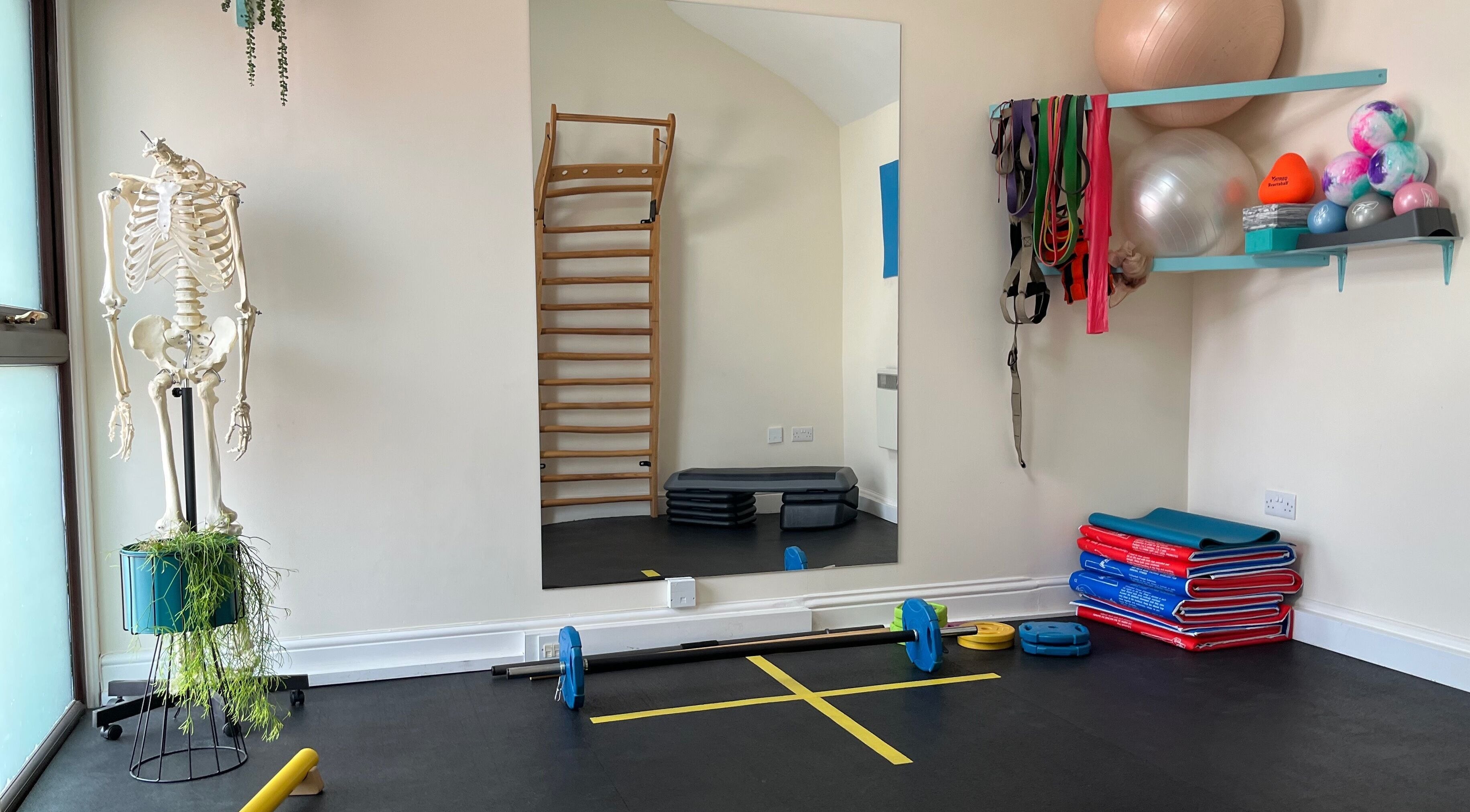 Fitness room at Fern Bodyworks, Hextable, England, GB with exercise equipment and decor.