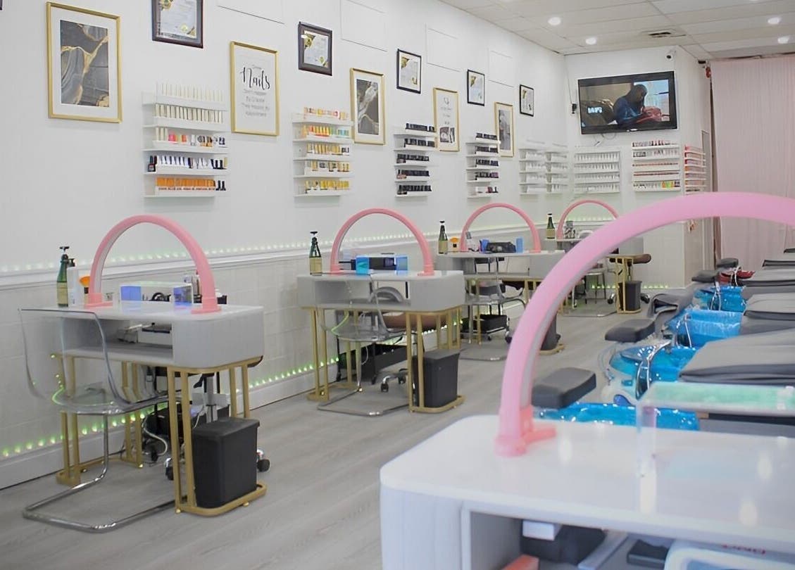 Stylish nail salon interior at Top Q Nails(Henry Pro Nails), Markham, Ontario, CA with modern decor and seating.
