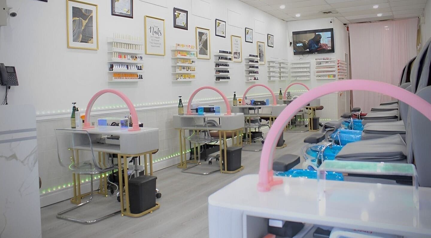 Stylish nail salon interior at Top Q Nails(Henry Pro Nails), Markham, Ontario, CA with modern decor and seating.
