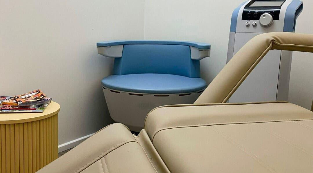 The Age Well Room in Maroochydore, Queensland, AU, featuring a serene treatment area with a comfortable chair.