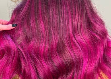 Vibrant pink hair waves crafted at Hair by LAW, Worcester, England, GB, showcasing expert styling.