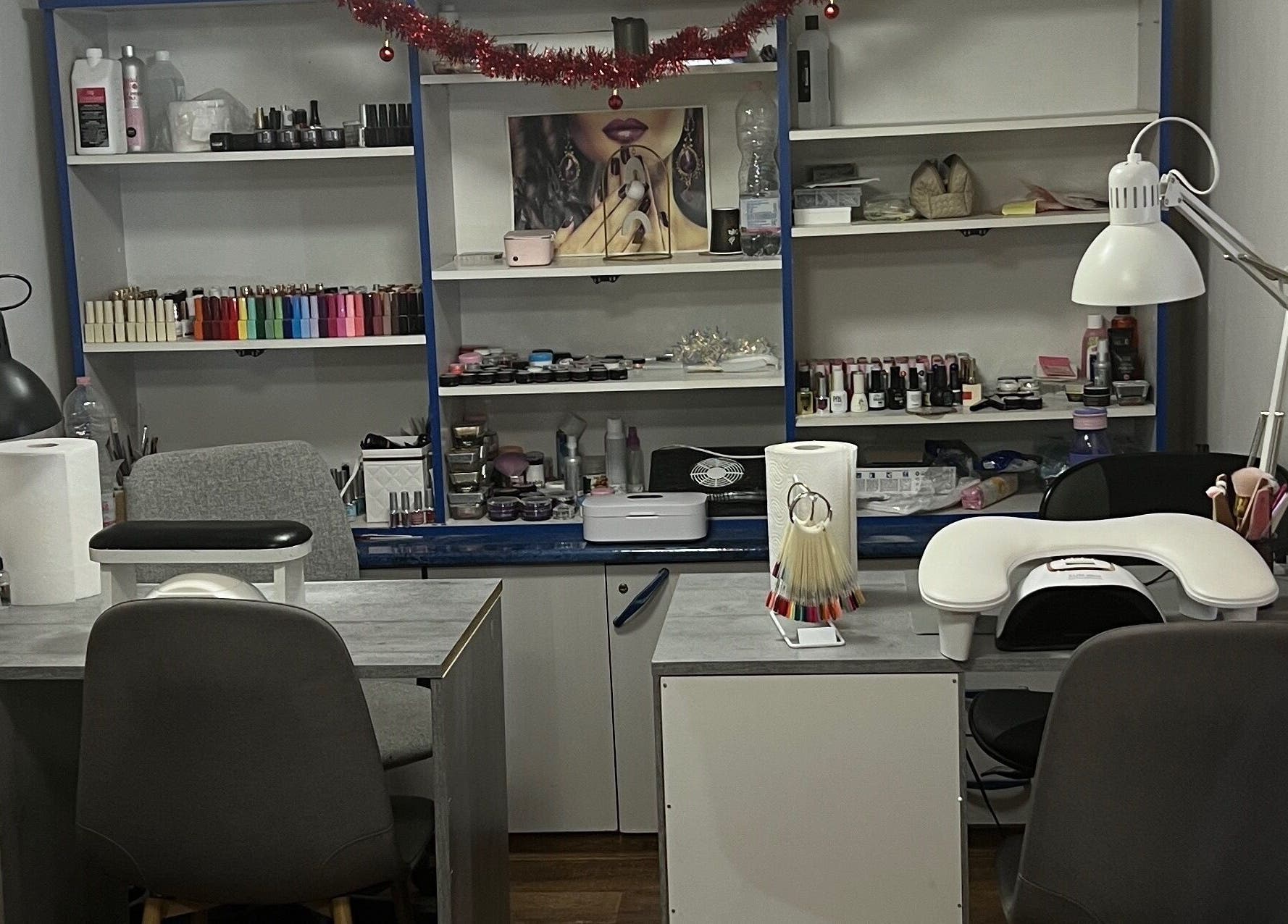 Nail station at Shenail_beauty, Budapest, Magyar, HU with nail polish palettes and manicure tools.