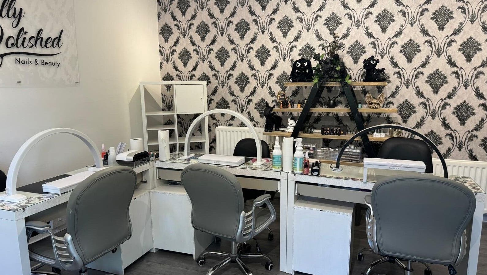 Chic nail stations at Totally Polished in Village, England, GB with elegant decor and modern furnishings.