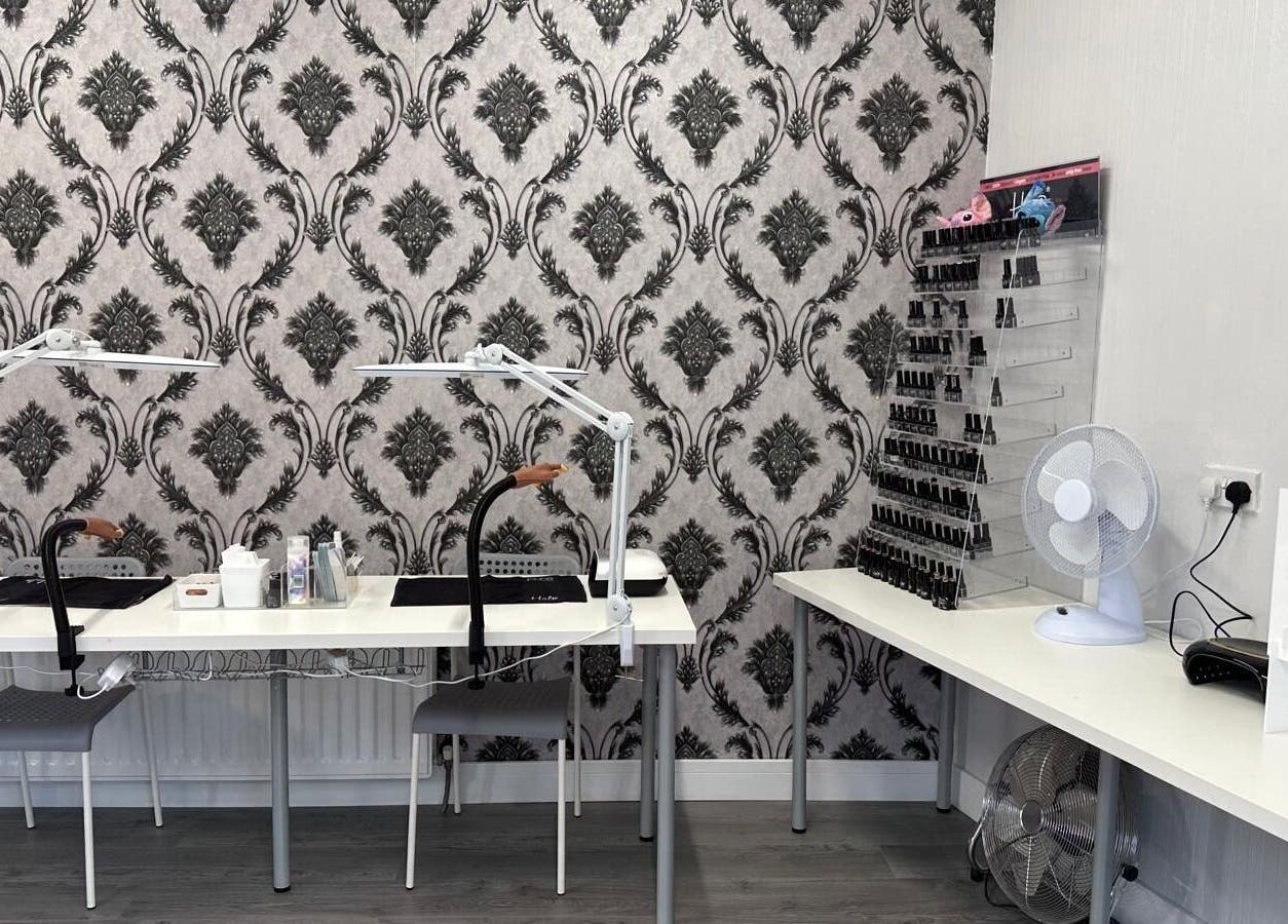 Totally Polished nail area with elegant wallpaper in Village, England, GB.