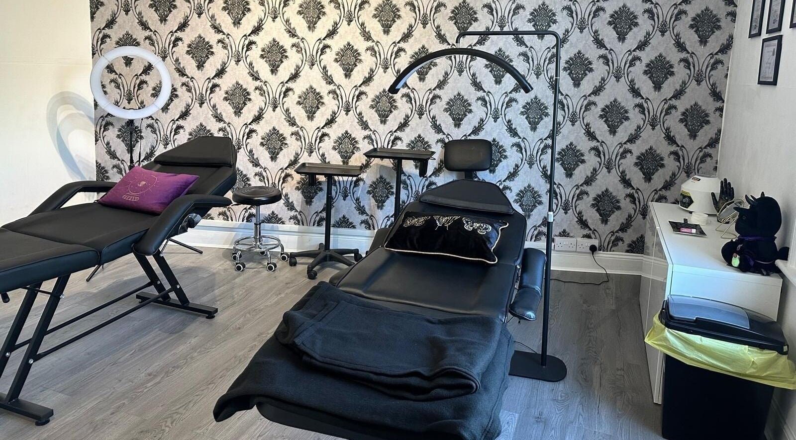 Luxury treatment room at Totally Polished, Newcastle upon Tyne, England, GB with stylish decor and comfortable seating.