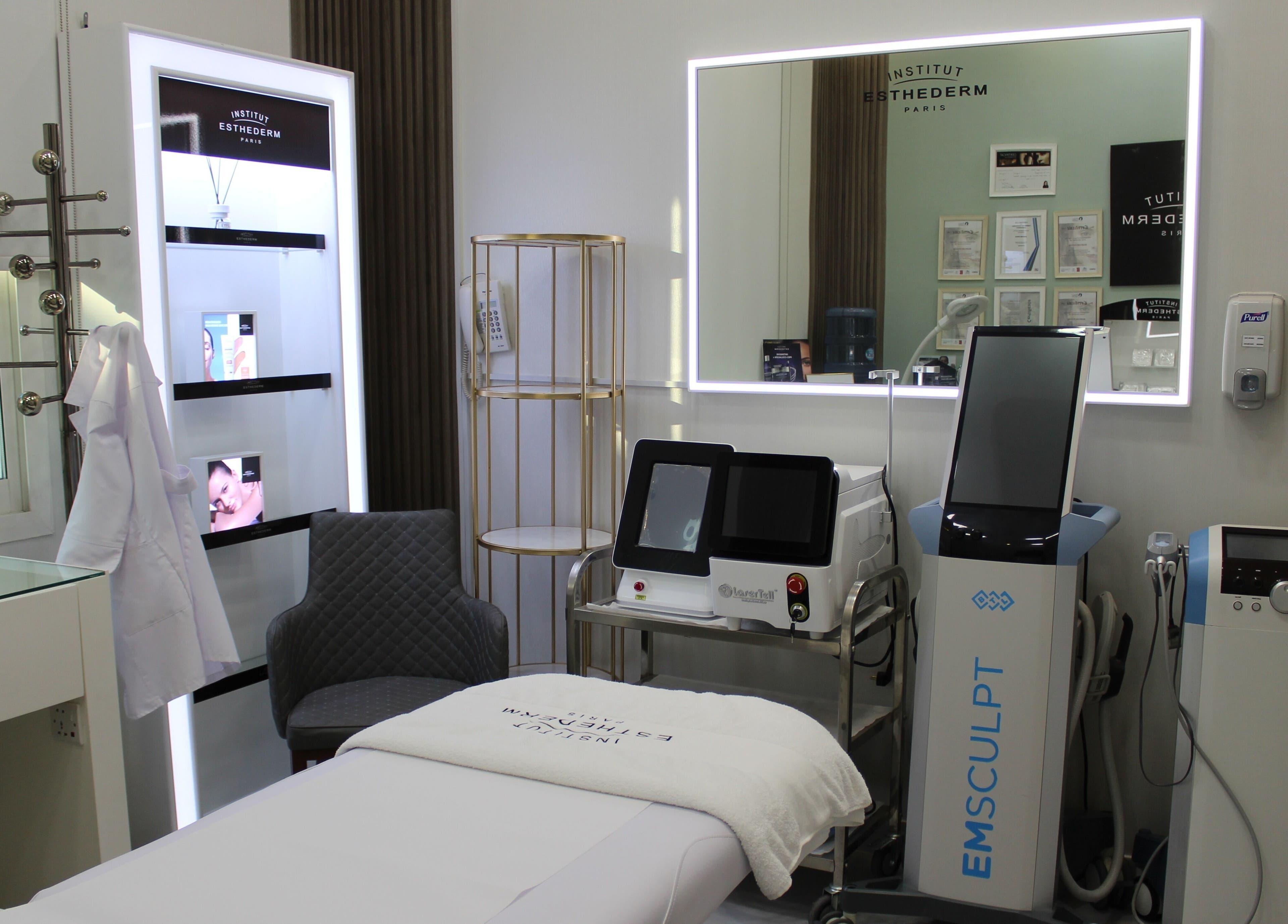 Treatment room at Renew and Revive Polyclinic, Dubai, Dubai, AE featuring advanced beauty equipment.