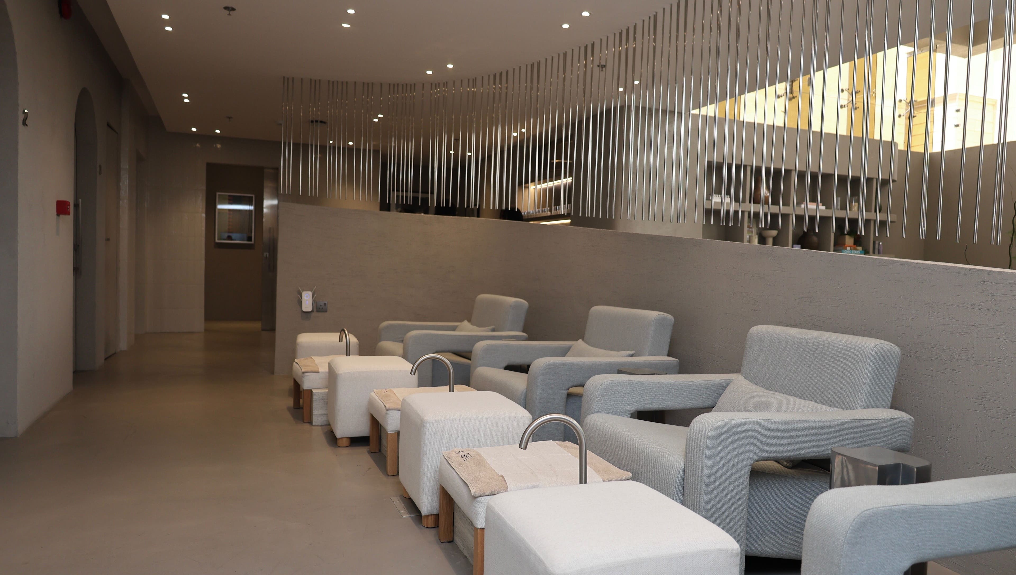 Modern pedicure lounge at The Hair.sa in Riyadh, Riyadh Province, SA with comfortable seating.