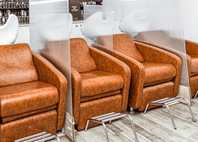 Luxurious salon chairs at Elixir Hair & Beauty, Gold Coast, Queensland, AU.