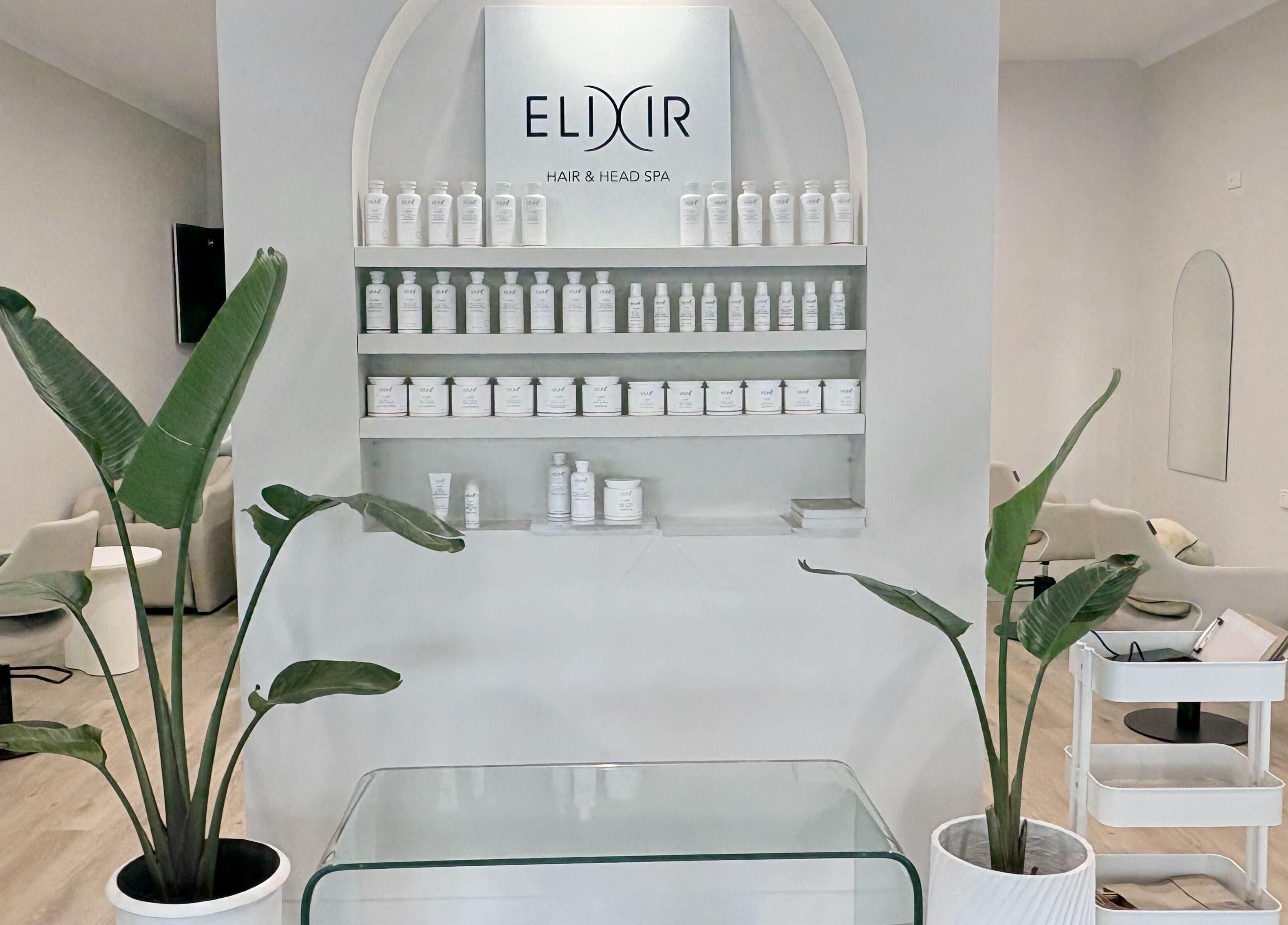 Elixir Hair & Head Spa Tugun interior with stylish decor and product display, Tugun, Queensland, AU.