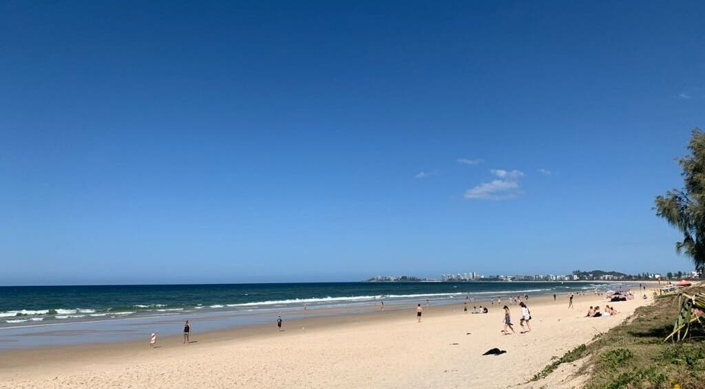 Sunny beach scene near Elixir Hair & Head Spa Tugun in Tugun, Queensland, AU. Relaxing beaches and blue skies.