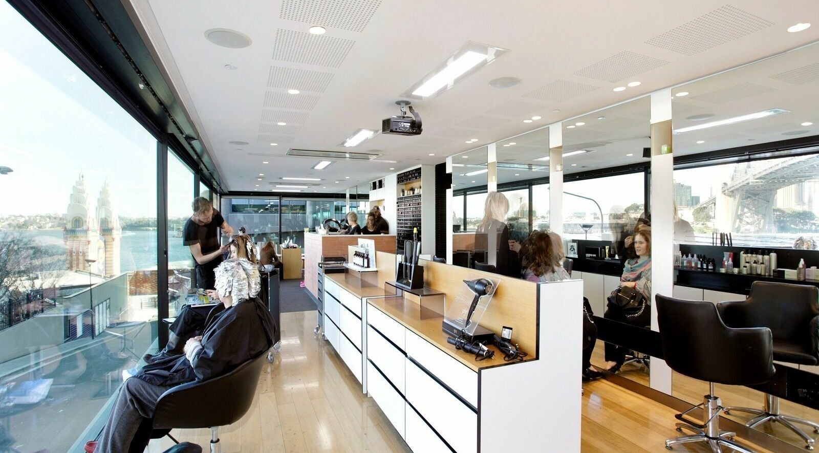 Stylish interior of Wild Life Hair Origin salon in Milsons Point, New South Wales with stunning views.
