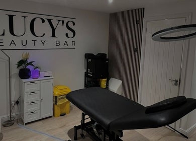 Relaxing interior of Lucy's Beauty Bar in Allington, England, GB featuring treatment table and elegant decor.