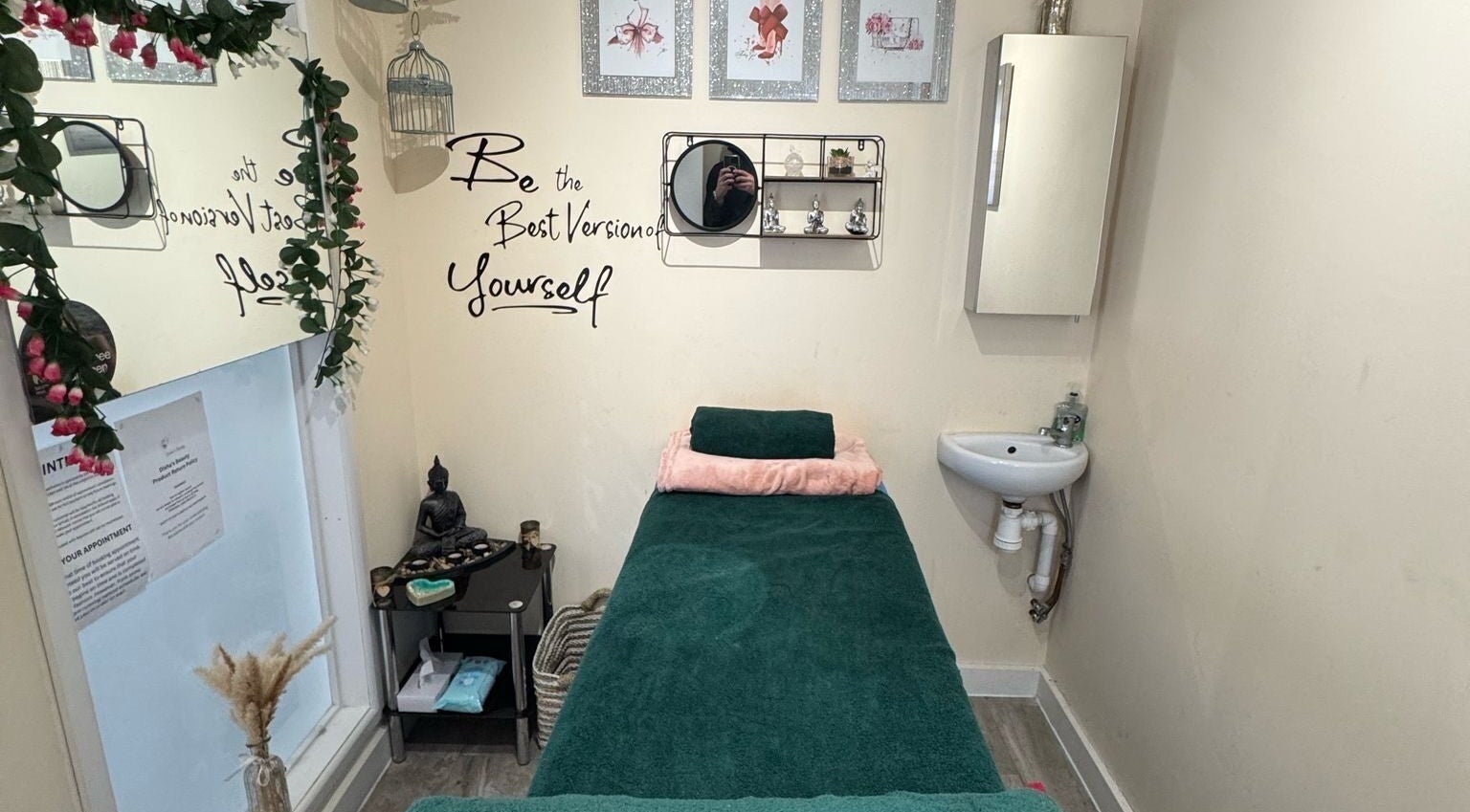 Relaxing treatment room at Disha’s Beauty in Chelmsford, England, GB, featuring calming decor and a cozy bed.