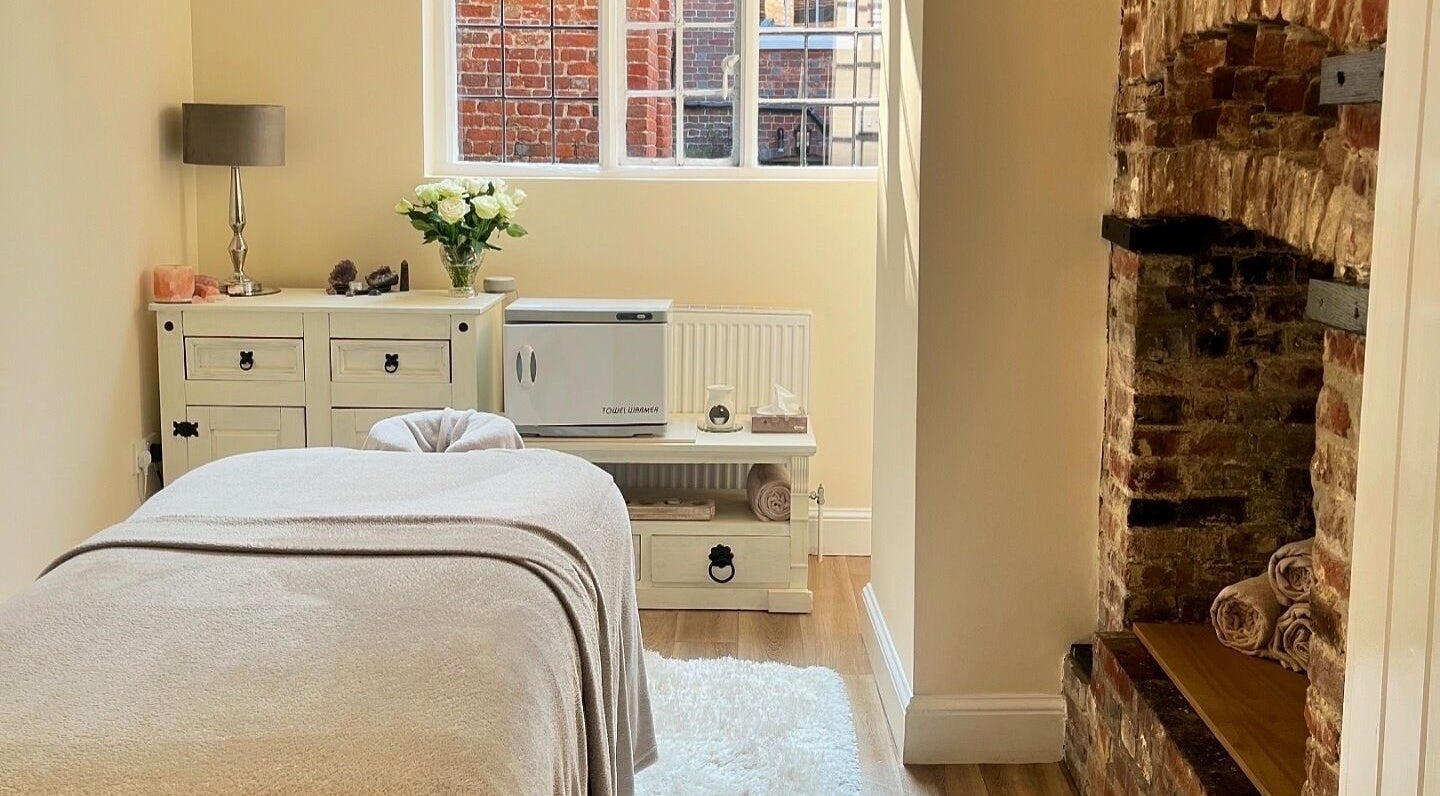 Relaxing therapy room at Samantha Pope Holistics, Fareham, England, GB with cozy decor and calming ambiance.