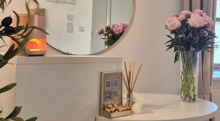 Elegant decor at The SKN Edit (Nude Studio) in Cockenzie Port Seton, Scotland, GB, featuring flowers and diffuser.