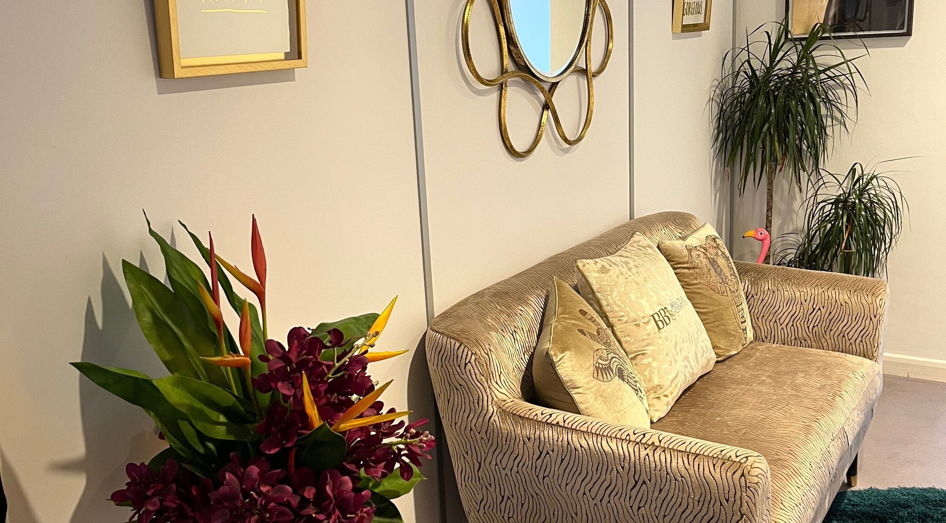 Chic seating area at Warwickshire Aesthetics Collective, Stratford-upon-Avon, England, GB with stylish decor.