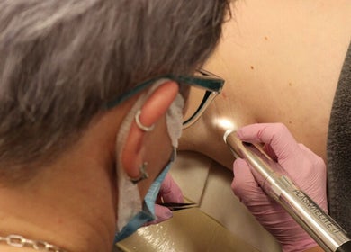 Expert performing precision skin treatment at Warwickshire Aesthetics Collective, Stratford-upon-Avon, England, GB.