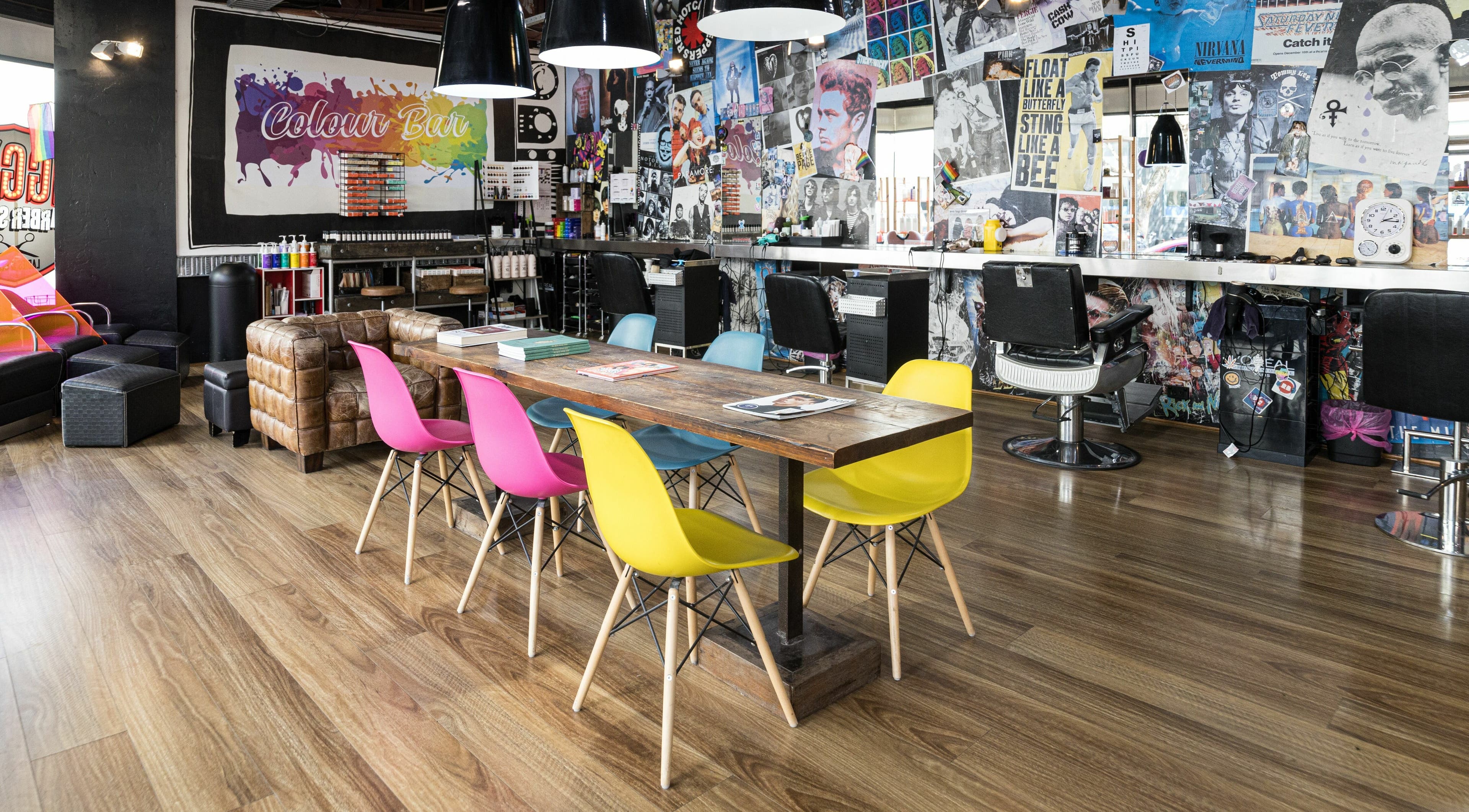 Ziggy's Barber Salon in Surry Hills, NSW, AU, showcasing colorful seating and stylish decor.