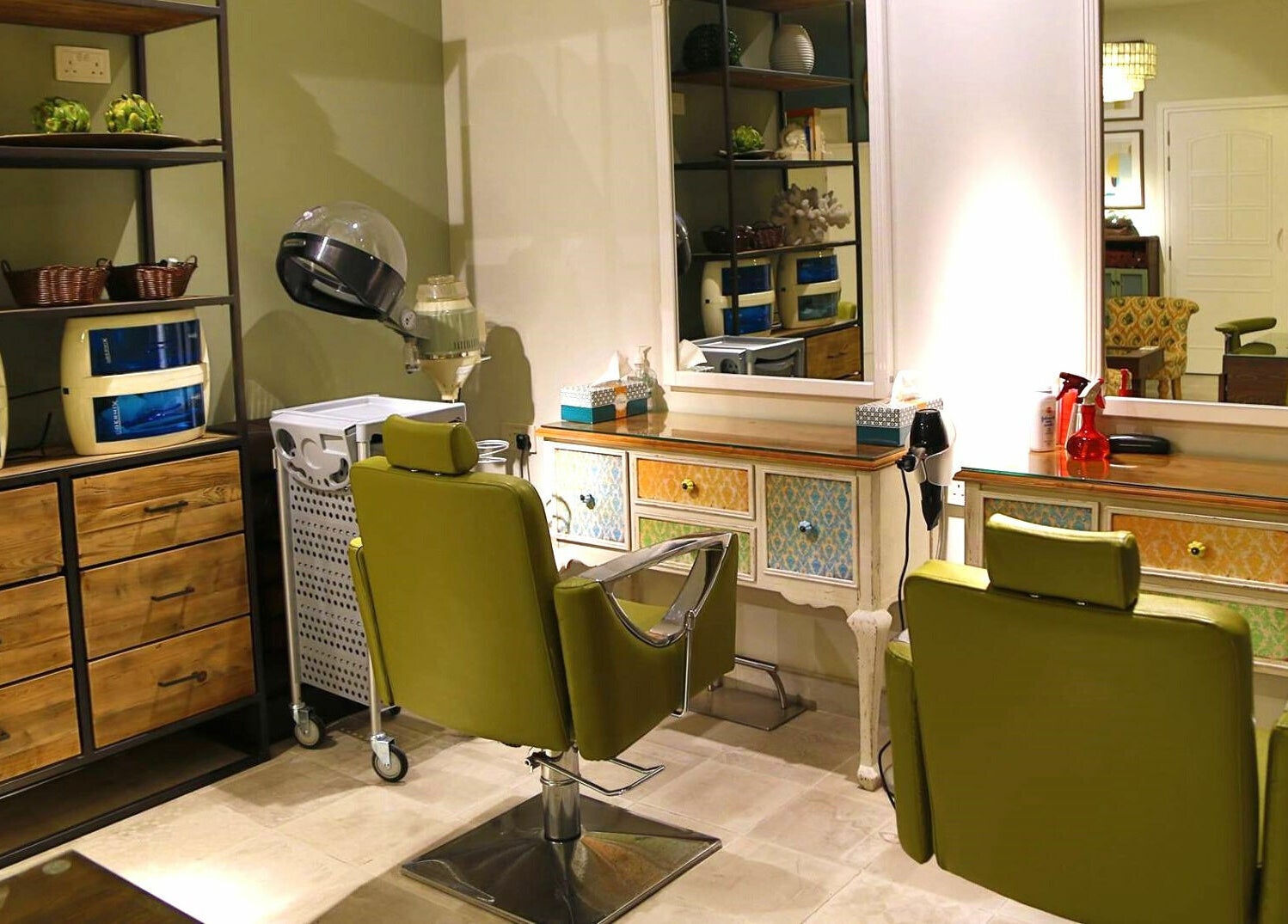 Modern salon interior at Serene Beauty & Spa, Abu Dhabi offers comfort and style in vibrant green chairs.