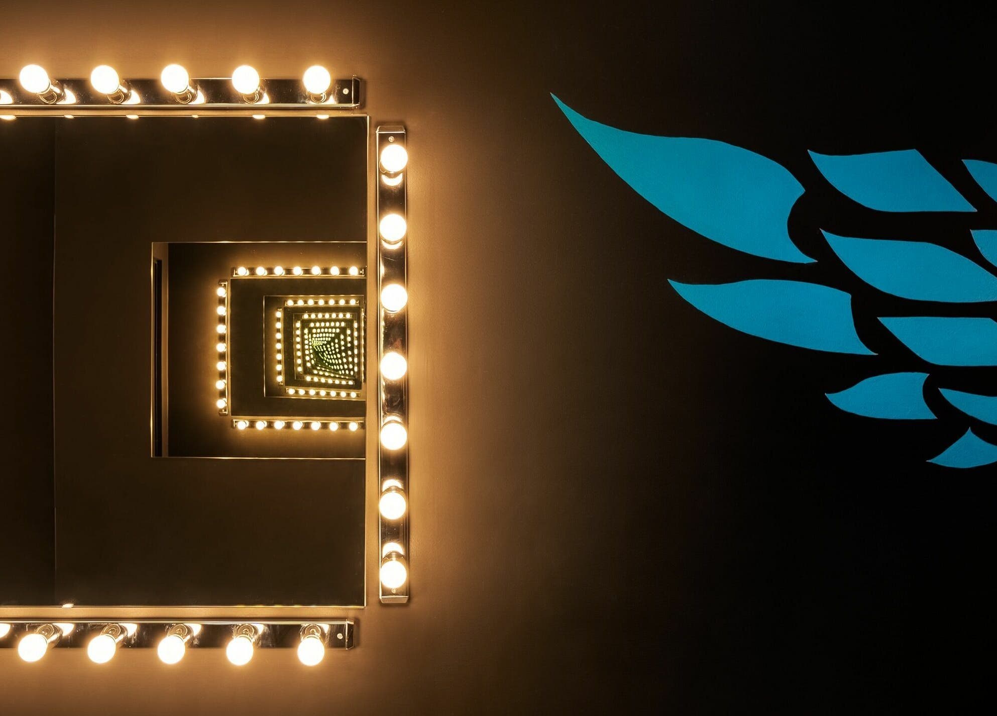 Glamorous mirror lights at Carousel, Angel Body Jewellery and Piercing, Cannington. Located in Cannington, Western Australia, AU.