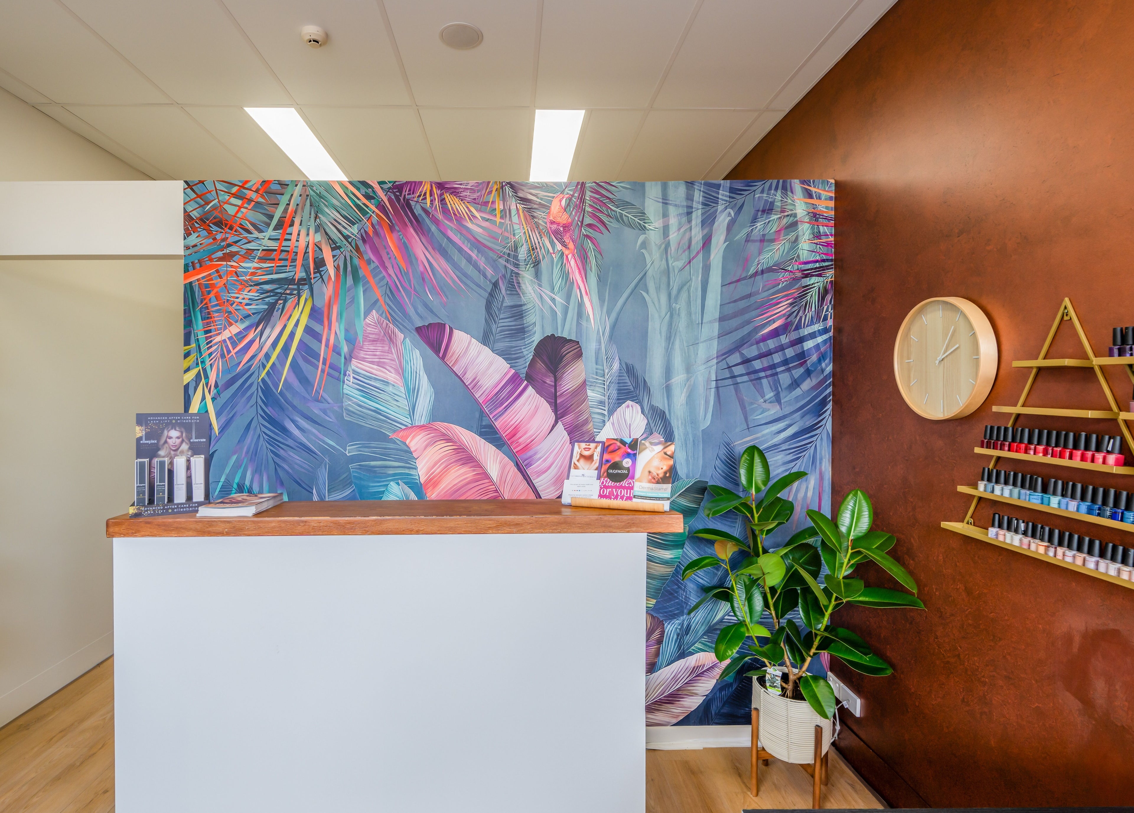 Sorrento Skin and Beauty reception in Sorrento, Victoria, AU with vibrant wall art and nail polish display.