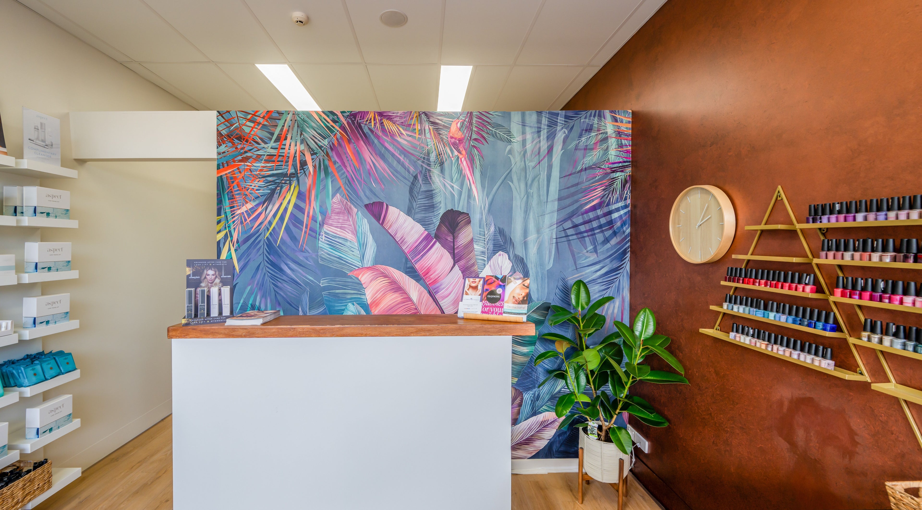 Sorrento Skin and Beauty reception in Sorrento, Victoria, AU with vibrant wall art and nail polish display.