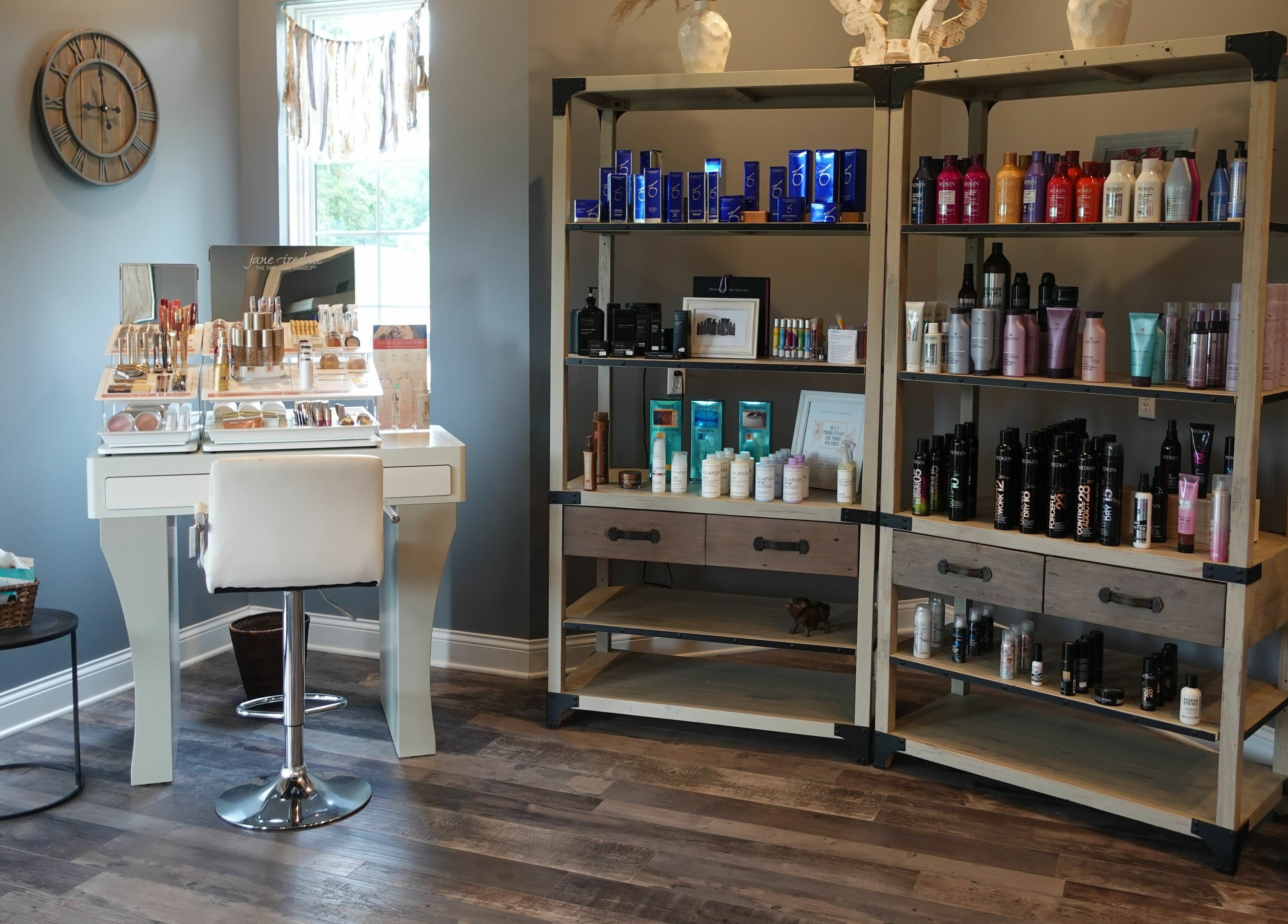Geneva Salon and Spa Suites in Lake Geneva, Wisconsin, US features a chic beauty product display unit.