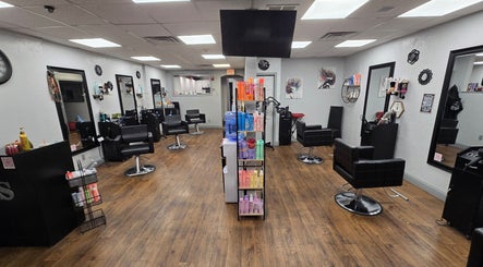 Interior of Bella Lina Salon in Warwick, Rhode Island, US featuring stylish salon chairs and hair products.