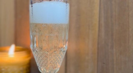 Crystal glass with bubbles and candlelight at The Hair Room at Mawson, Australian Capital Territory, AU.