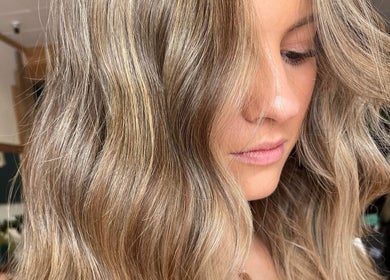 Close-up of wavy blonde hair styling at The Hair Room at Mawson, Mawson, Australian Capital Territory, AU.