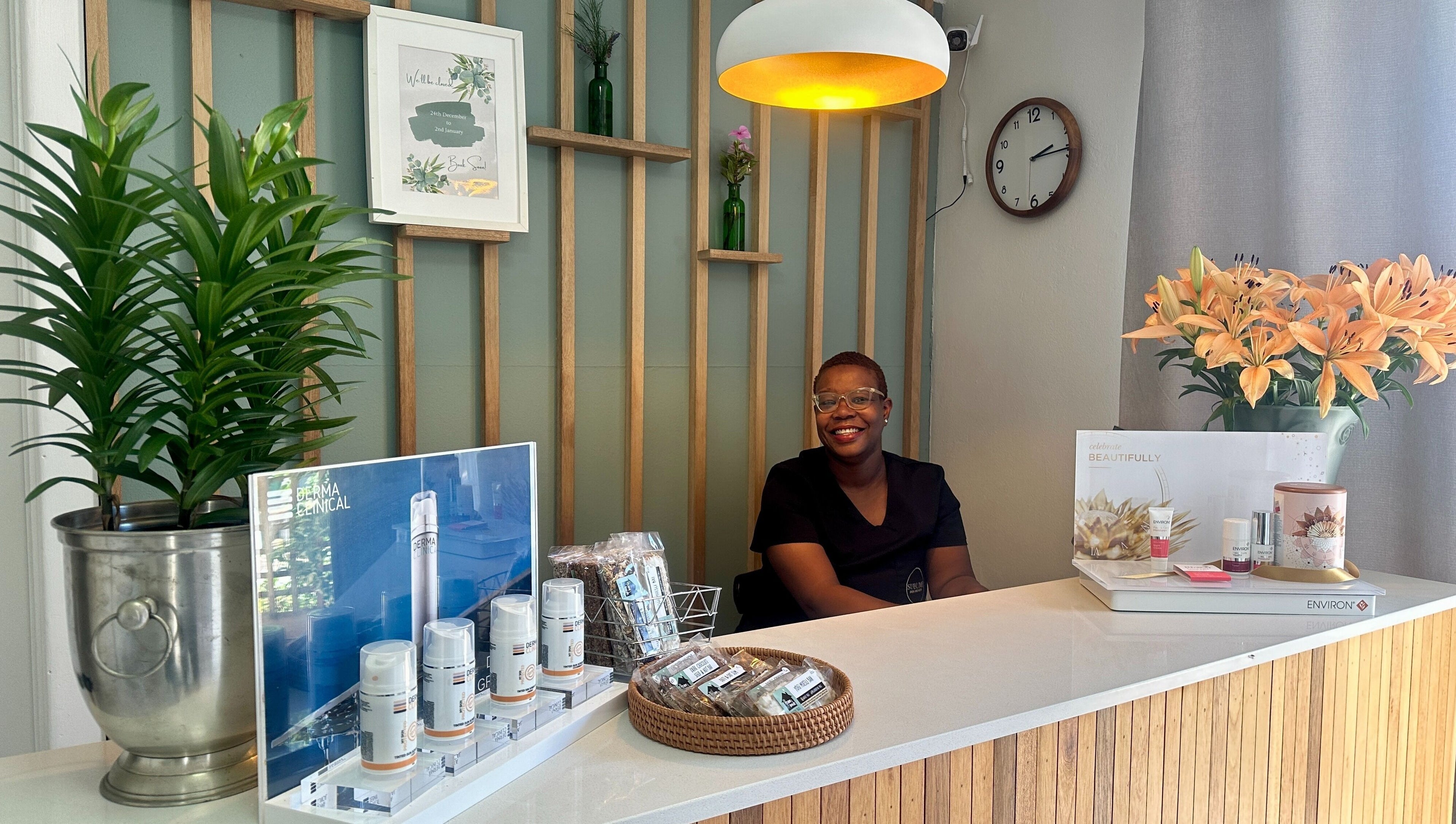 Reception area at Sublime Skin and Body in Cape Town, Western Cape, ZA showing friendly staff and beauty products.