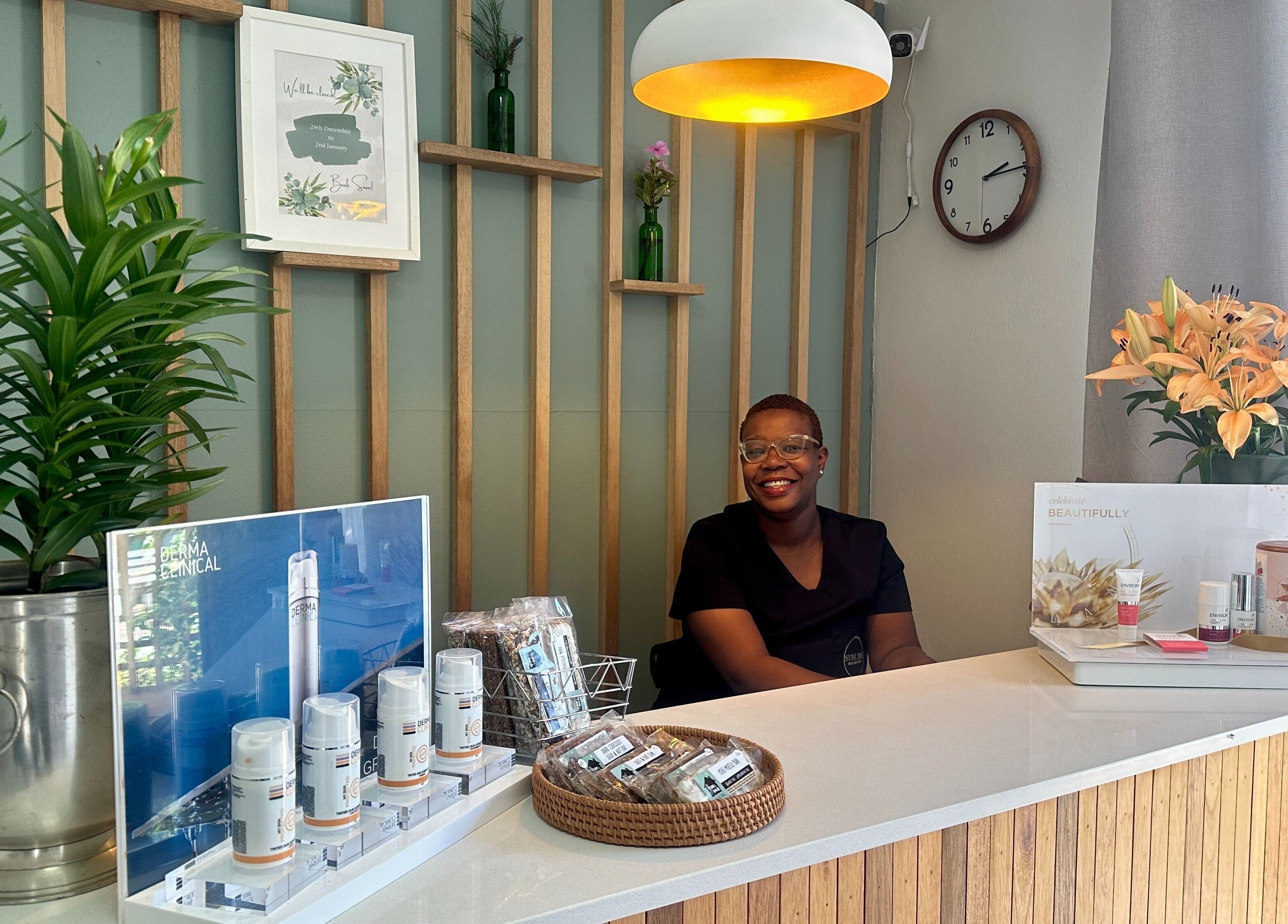 Reception area at Sublime Skin and Body in Cape Town, Western Cape, ZA showing friendly staff and beauty products.