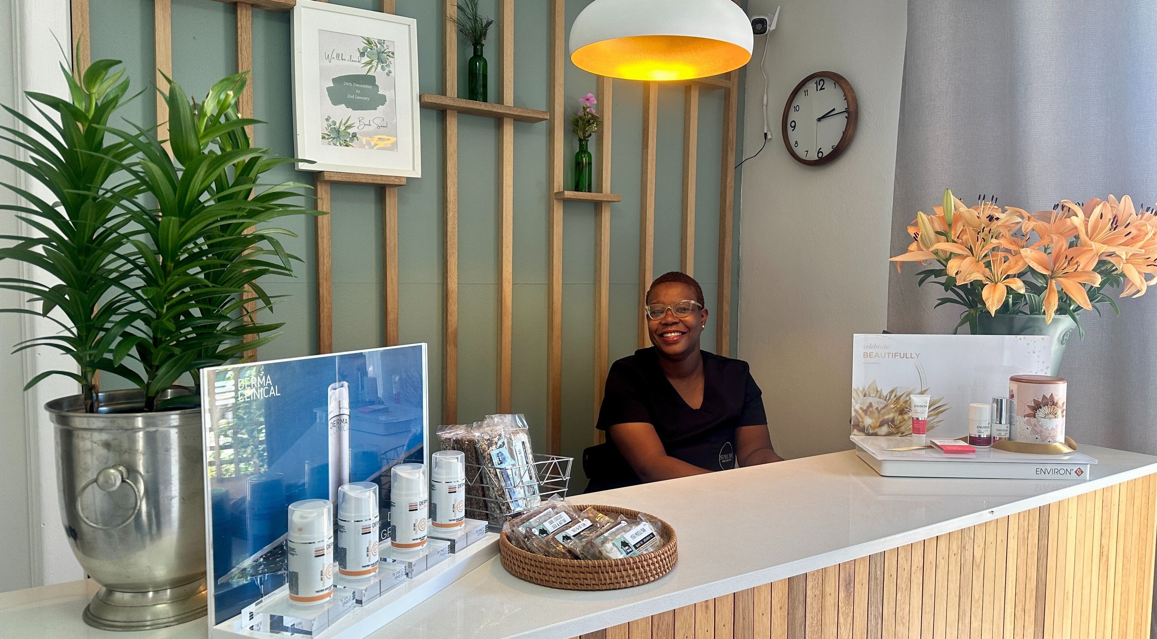 Reception area at Sublime Skin and Body in Cape Town, Western Cape, ZA showing friendly staff and beauty products.