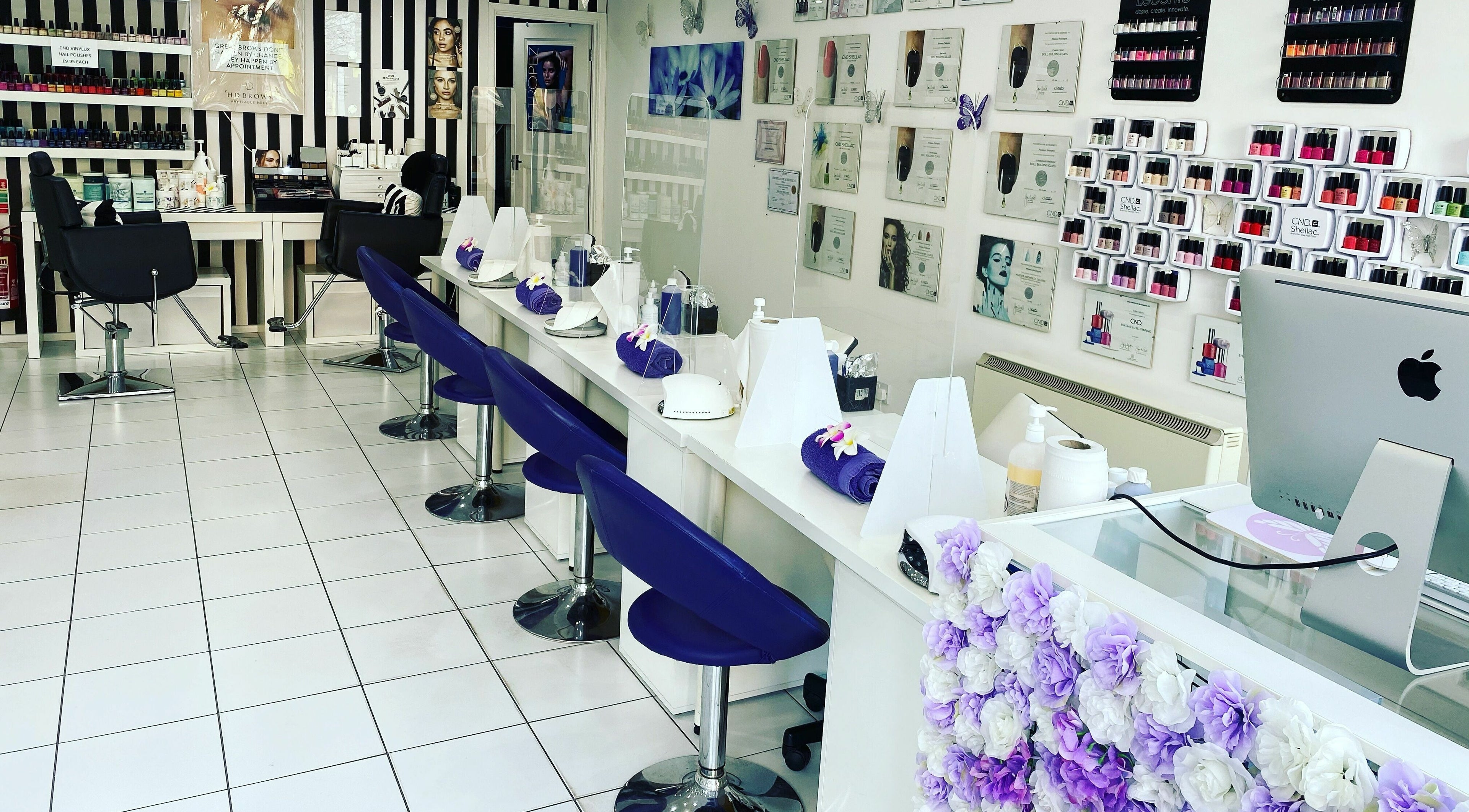 Bright, elegant interior of Rhiannons Nails in Torquay, England, GB showcasing modern nail stations.