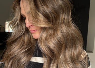 Close-up of luxurious wavy hair styling at THE Hairdressers, Lowestoft, England, GB.