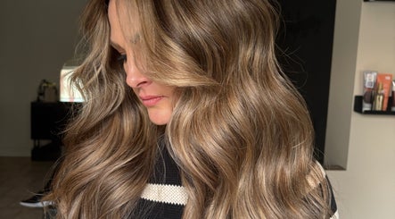 Close-up of luxurious wavy hair styling at THE Hairdressers, Lowestoft, England, GB.