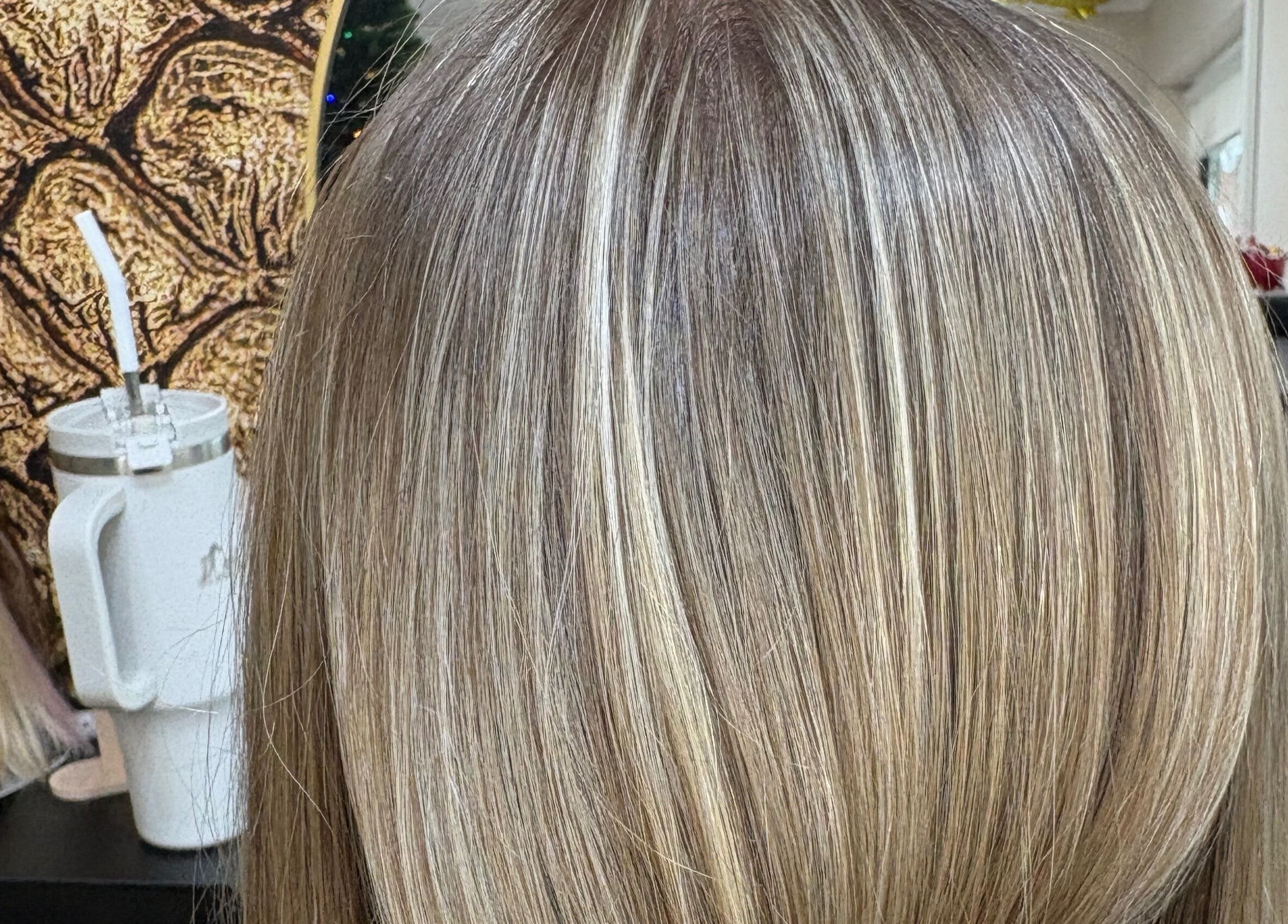 Gorgeous blonde highlights at THE Hairdressers, Lowestoft, England, GB showcasing expert coloring.