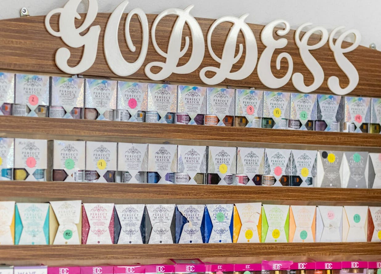 Nail polish display at Goddess Nails and Spa.LLC, West Allis, Wisconsin, US, showcasing vibrant colors.