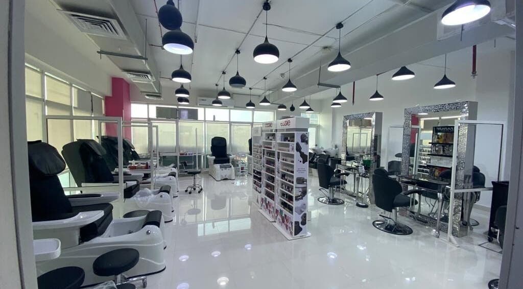 Interior of Eternal Lotus Ladies Salon And Spa in دبي, دبي, AE, featuring modern styling chairs and nail stations.