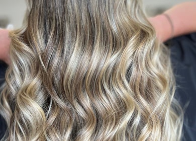 Beautiful blonde waves styled at Aurora House of Beauty in Eccles, England, GB.