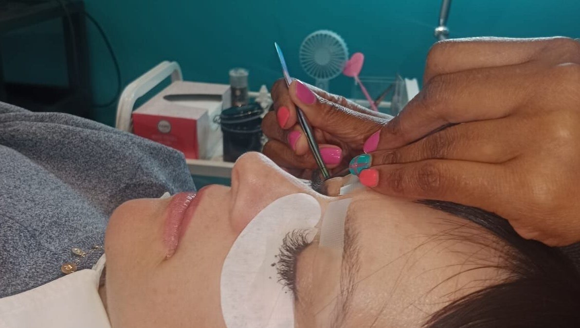 Lash extensions being applied at Glamlash Lash Studio, Johannesburg, Gauteng, ZA, showcasing meticulous technique.