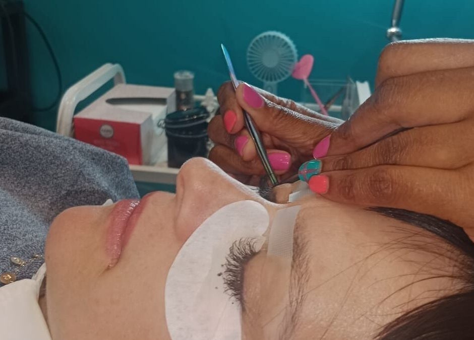 Lash extensions being applied at Glamlash Lash Studio, Johannesburg, Gauteng, ZA, showcasing meticulous technique.