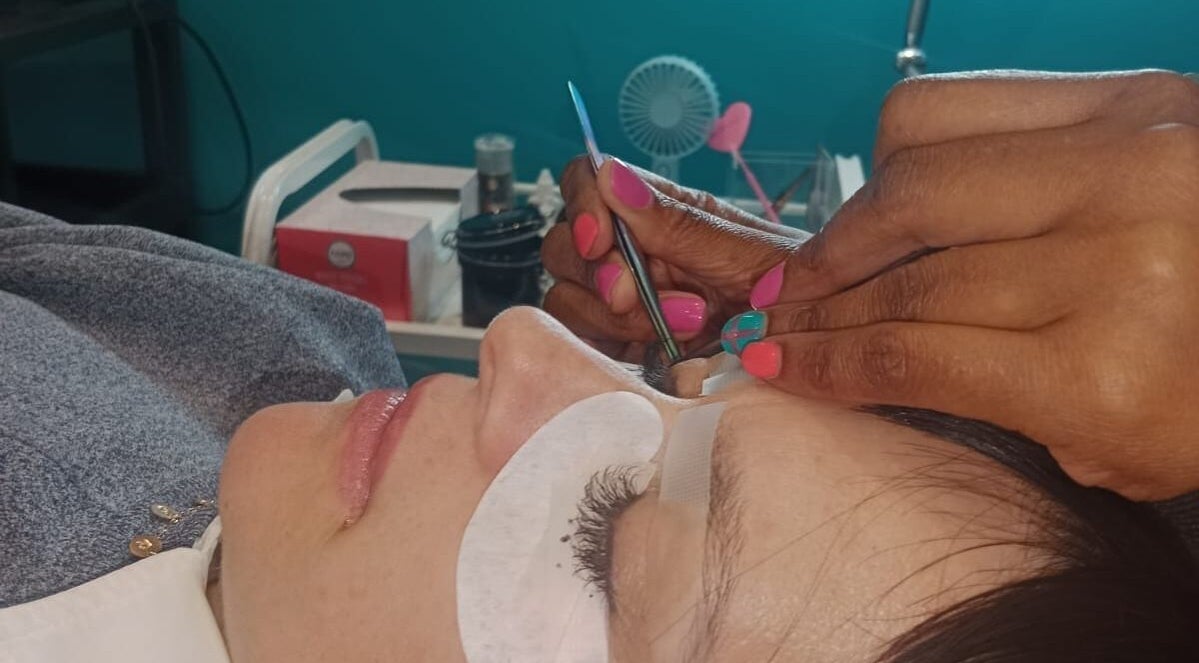 Lash extensions being applied at Glamlash Lash Studio, Johannesburg, Gauteng, ZA, showcasing meticulous technique.