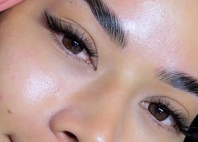Close-up of expertly shaped eyebrows at Studio Manetane & Auravive Wellness, Varsity Lakes, Queensland, AU.