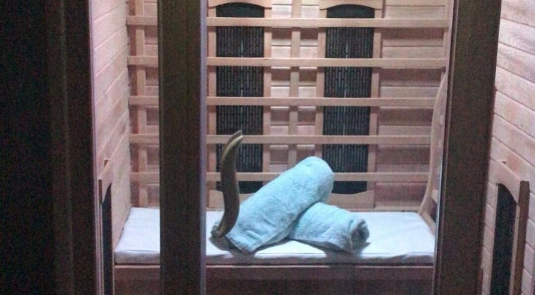 Relaxing sauna interior with towels at Time to Float, Calf Heath, England, GB.