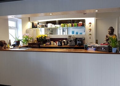 Elegant reception at Time to Float, Calf Heath, England, GB with plants and calming decor.