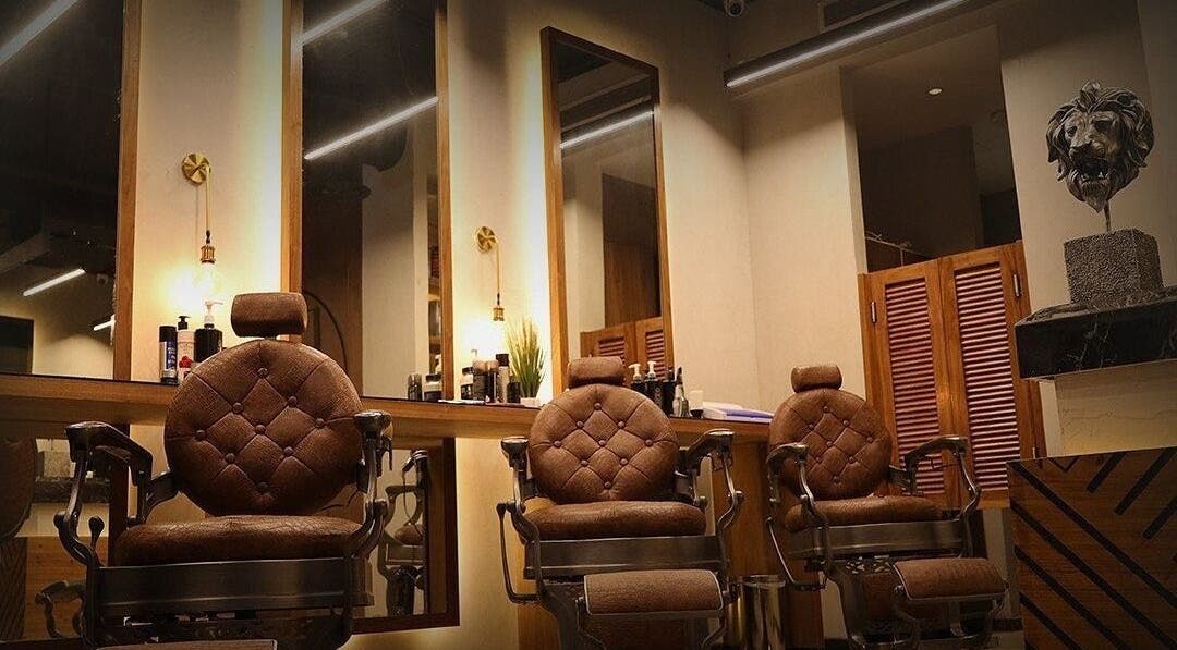 Elegant barber chairs at Dar Dujour Men, الرياض, منطقة الرياض, SA. Luxurious setting for men's grooming.