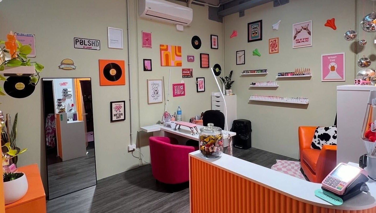 Trendy nail salon interior at Polished By Court in Auckland, Auckland, NZ with vibrant decor and cozy seating.